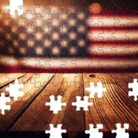 Flag On Wood Table Jigsaw Puzzle 1