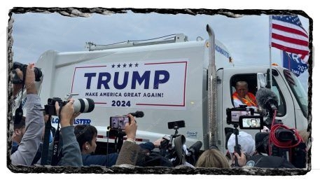 Trump Riding In A Garbage Truck For Wisconsin Rally Photo on Solid Slate