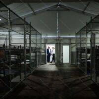 Trump Inspecting Alligator Alcatraz Metal Photo